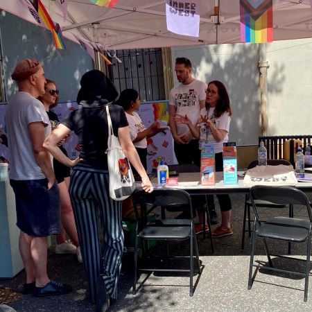 Staff helping at stall